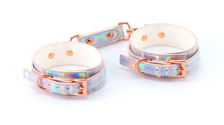 nsnovelties Cosmo Bondage Rainbow Wrist Cuffs — Holographic Vinyl, Rose Gold Hardware - NSN-1313-03